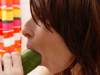 dame masterbating with cucumber. Photo #2